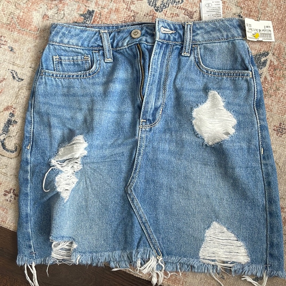 Hollister ripped Jean skirt. Size w24.